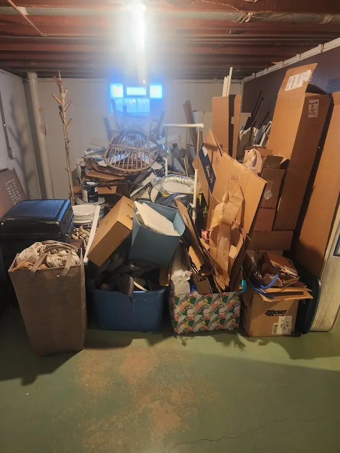 Roll-off dumpster container at job site for 2 Yard Dumpster Rental in Yeadon